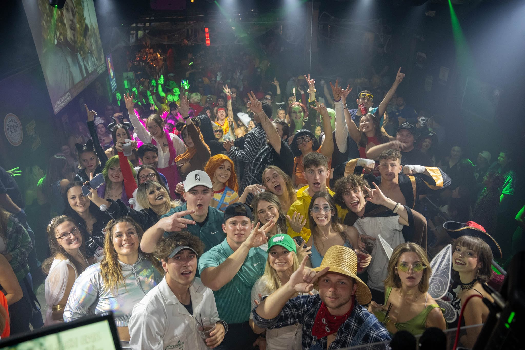Packed crowd facing the DJ booth at McCoy’s